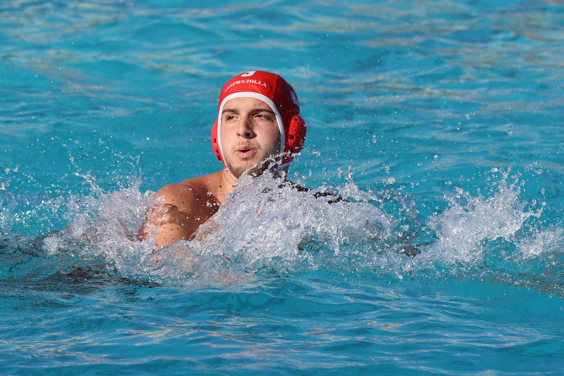 boys playing water polo against Madera