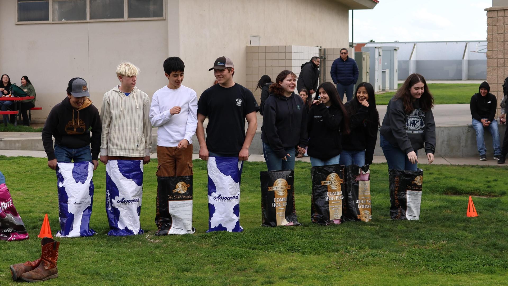 students and staff enjoying the feed bag relay