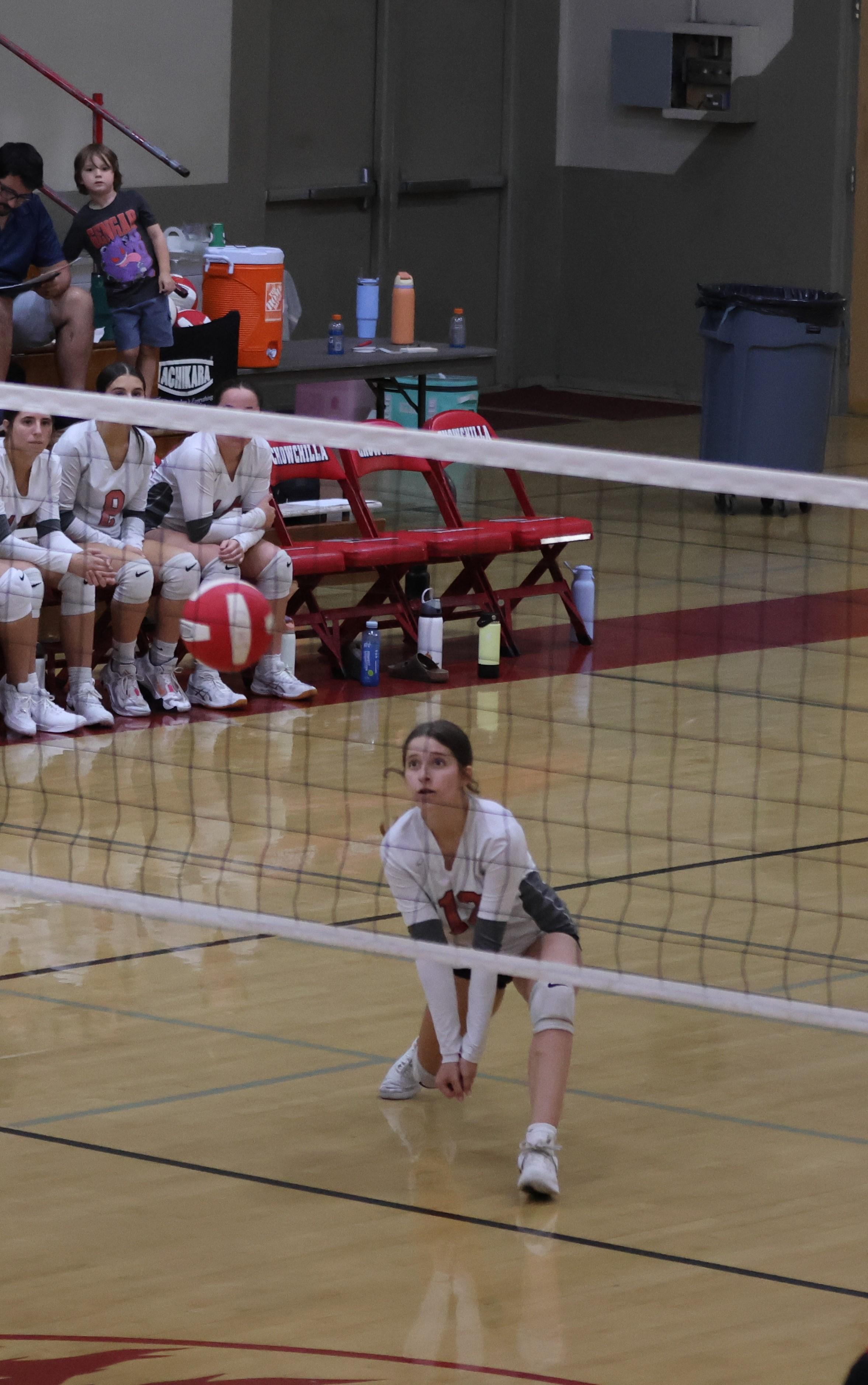 junior varsity girls playing volleyball 102