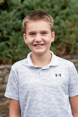 Center School Student, outside suring a sunny day