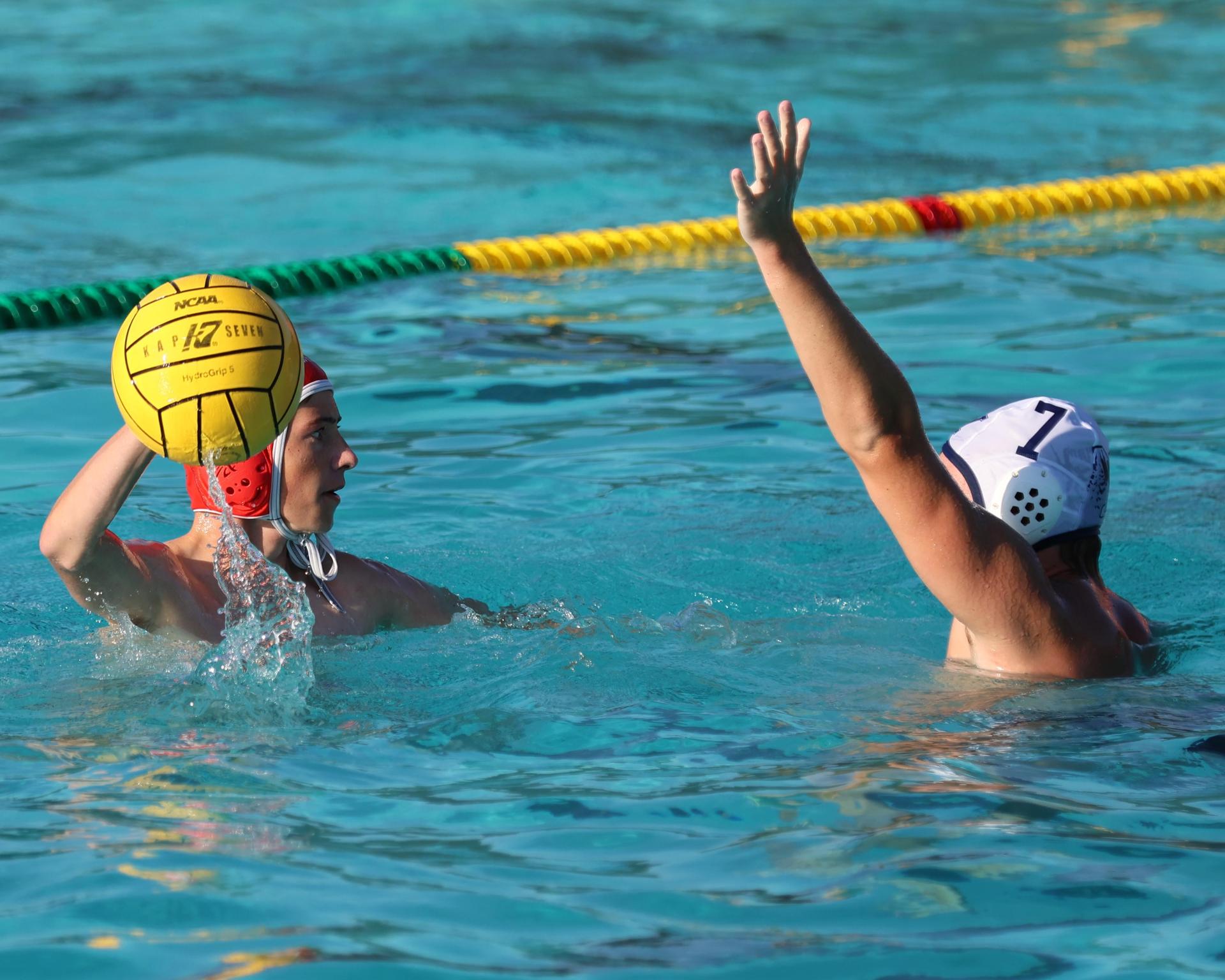 Boys playing water polo against Yosemite