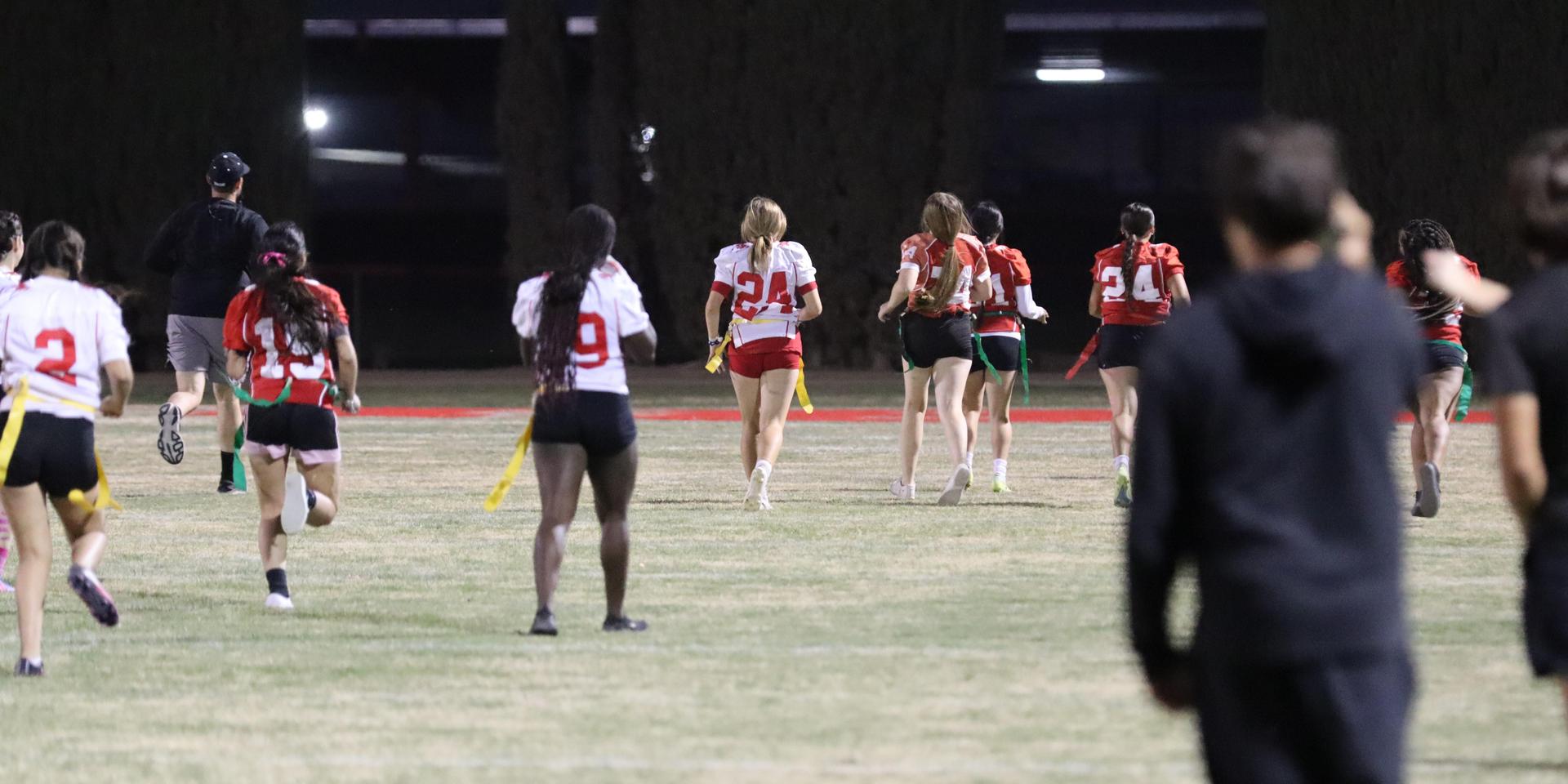 girls playing flag football