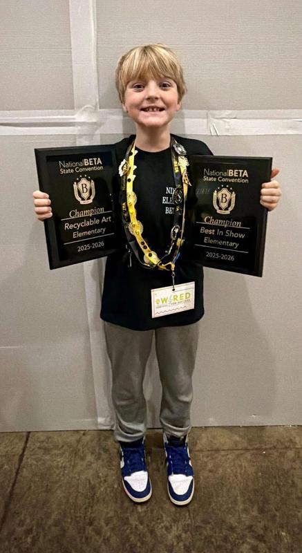 boy with awards