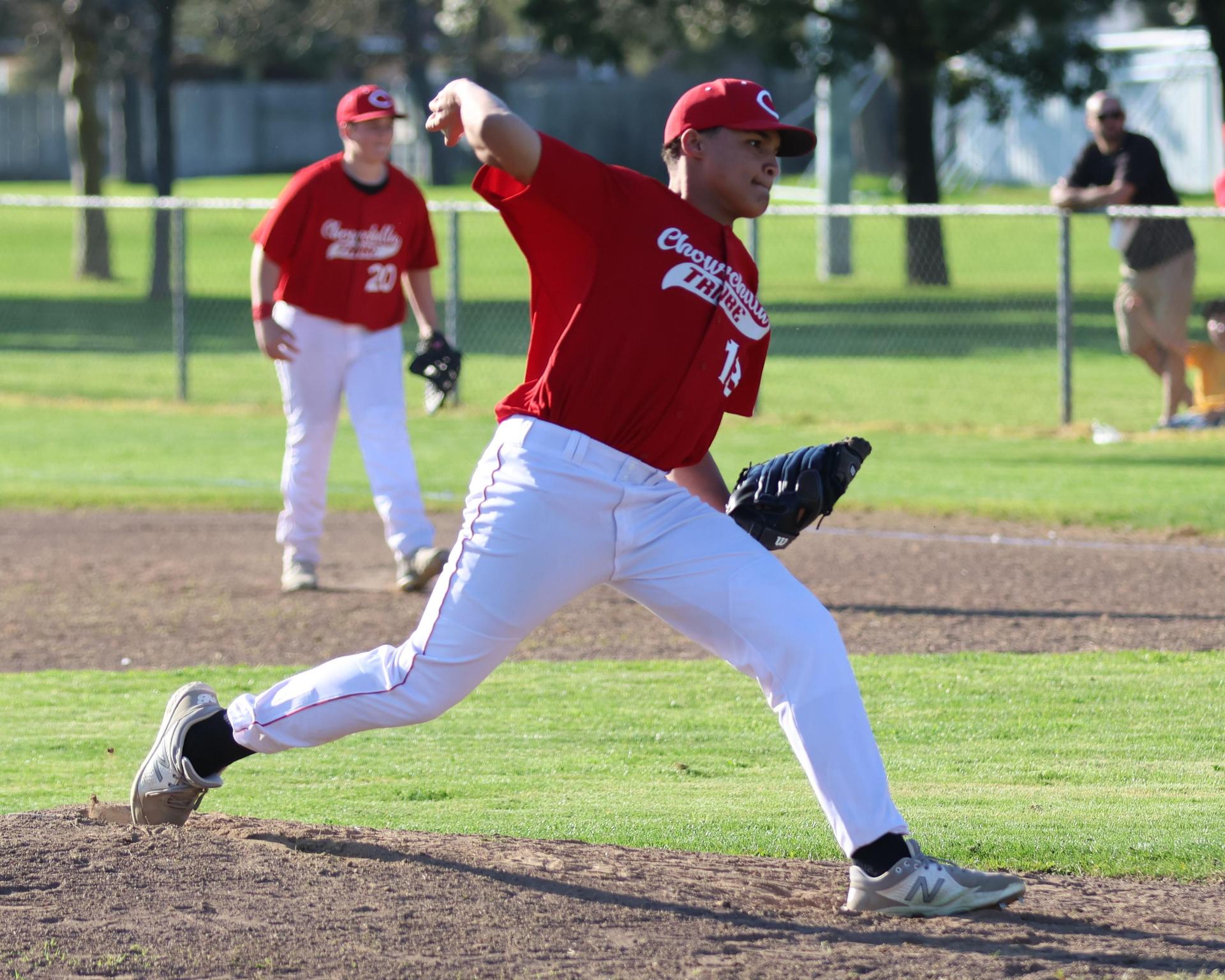 junior varsity baseball players in action