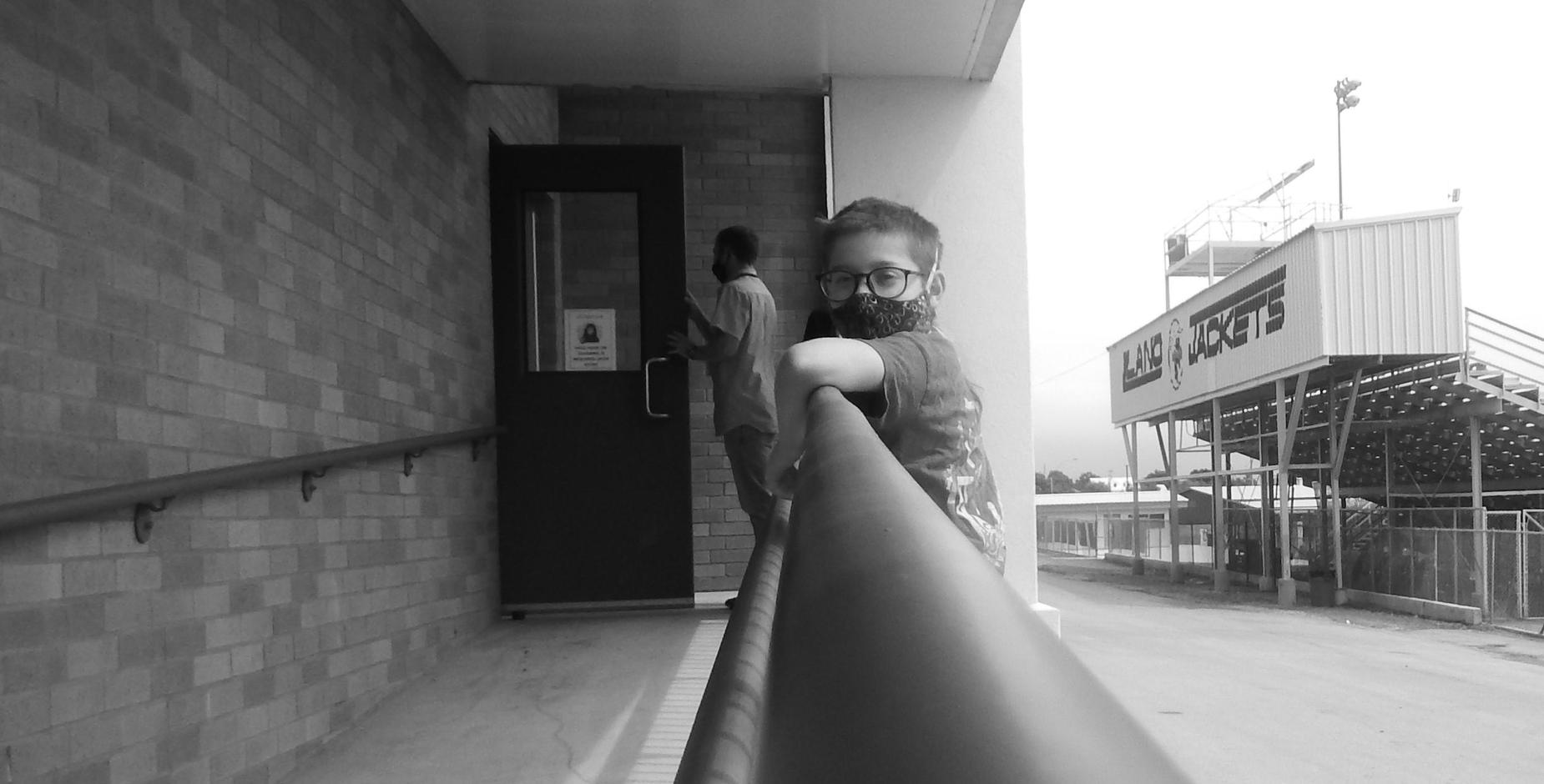 Child outside with mask