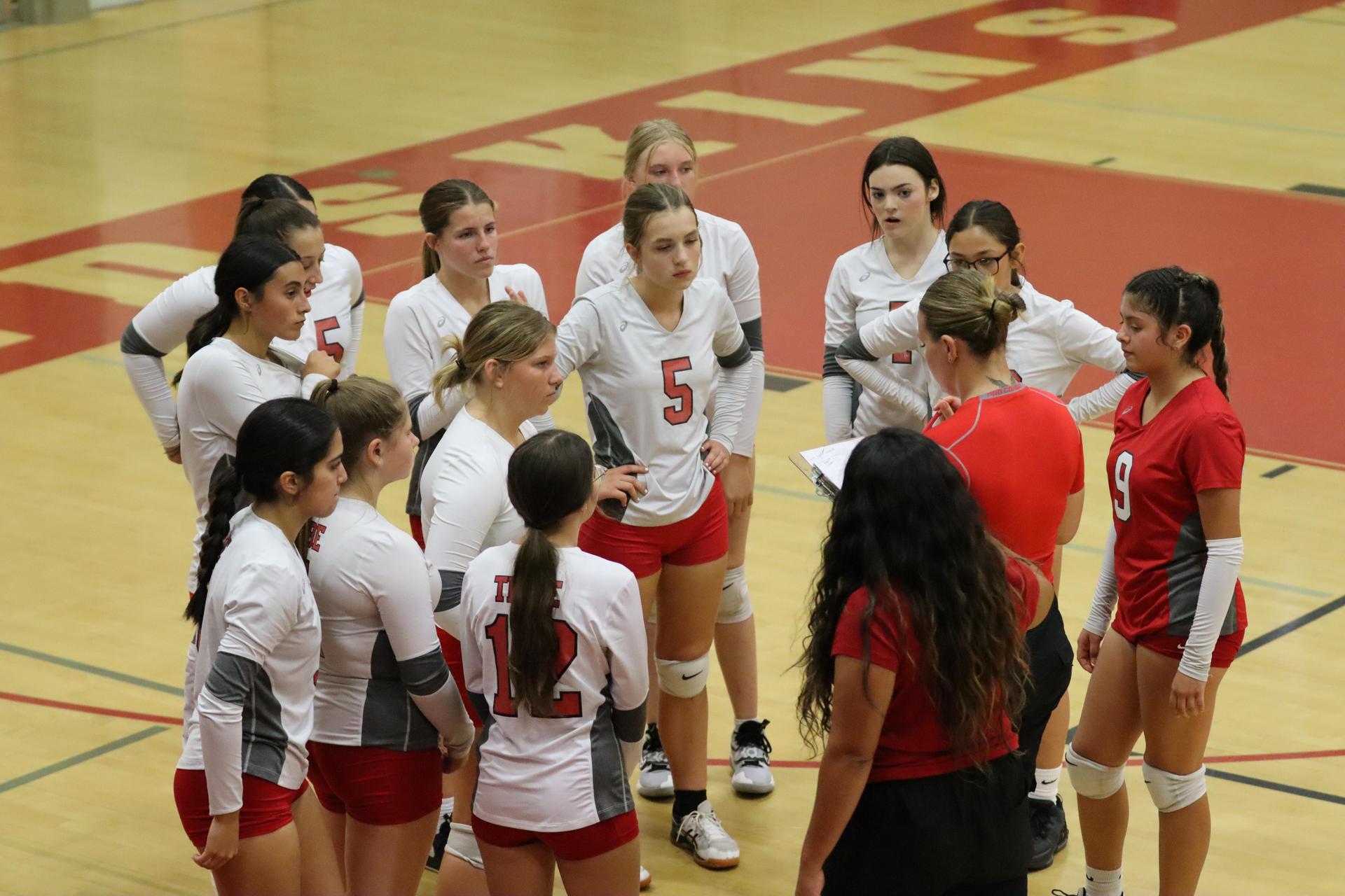 junior varsity girls playing volleyball against Yosemite