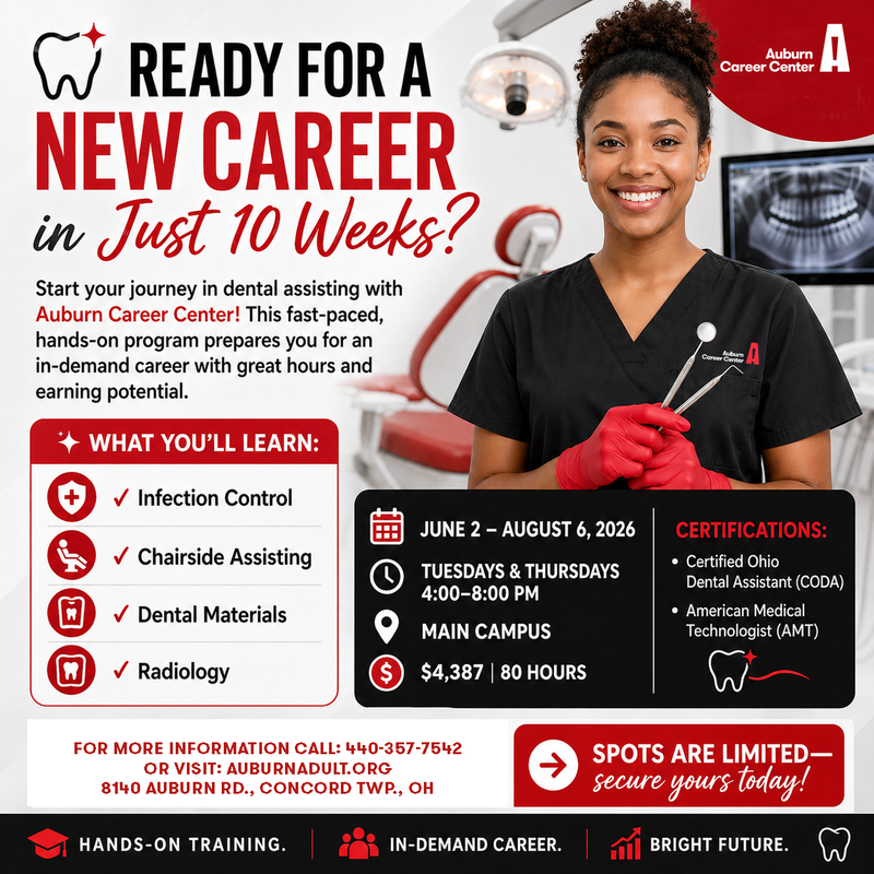 Lady smiling holding dental instruments