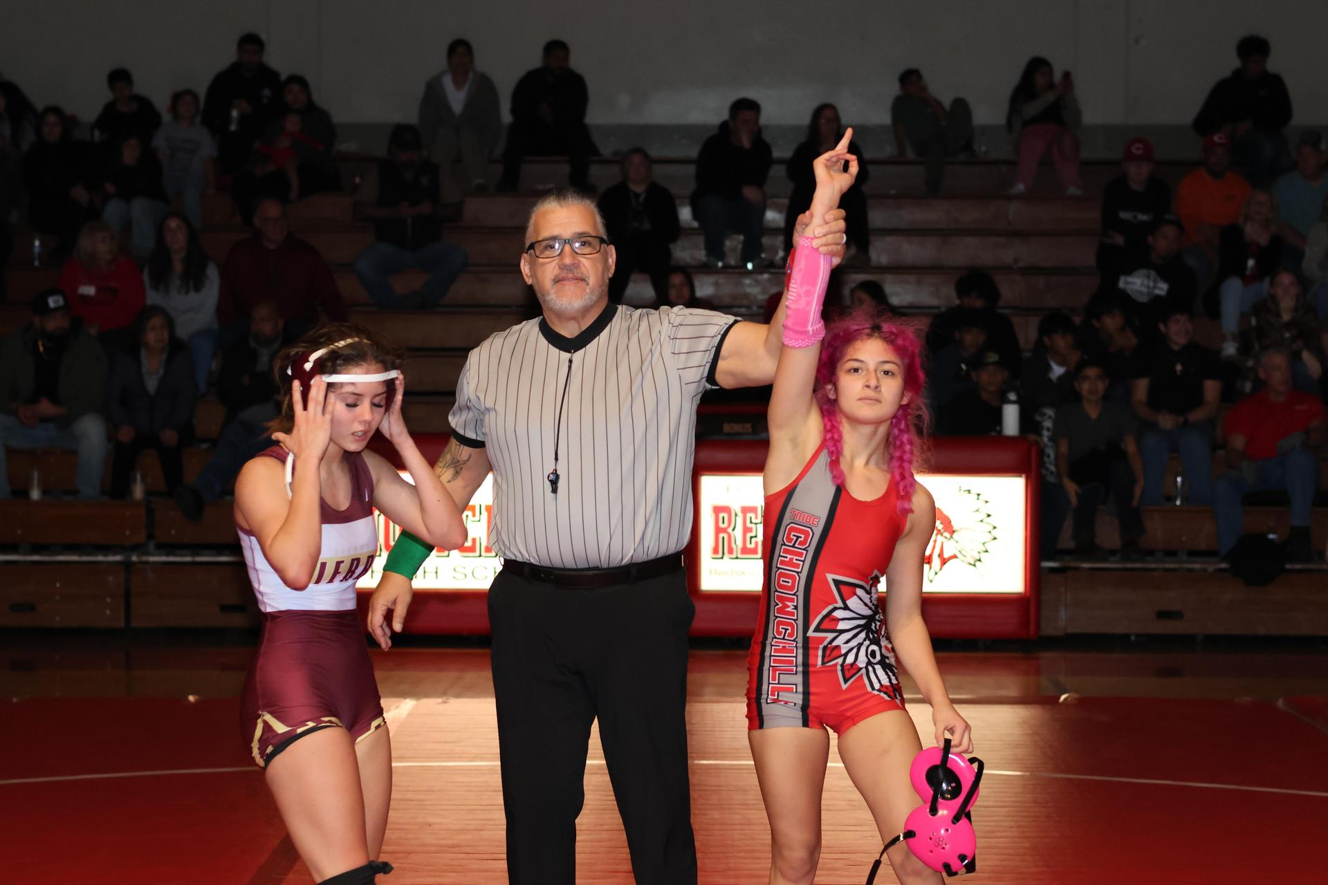 Wrestling winners with hands up 6