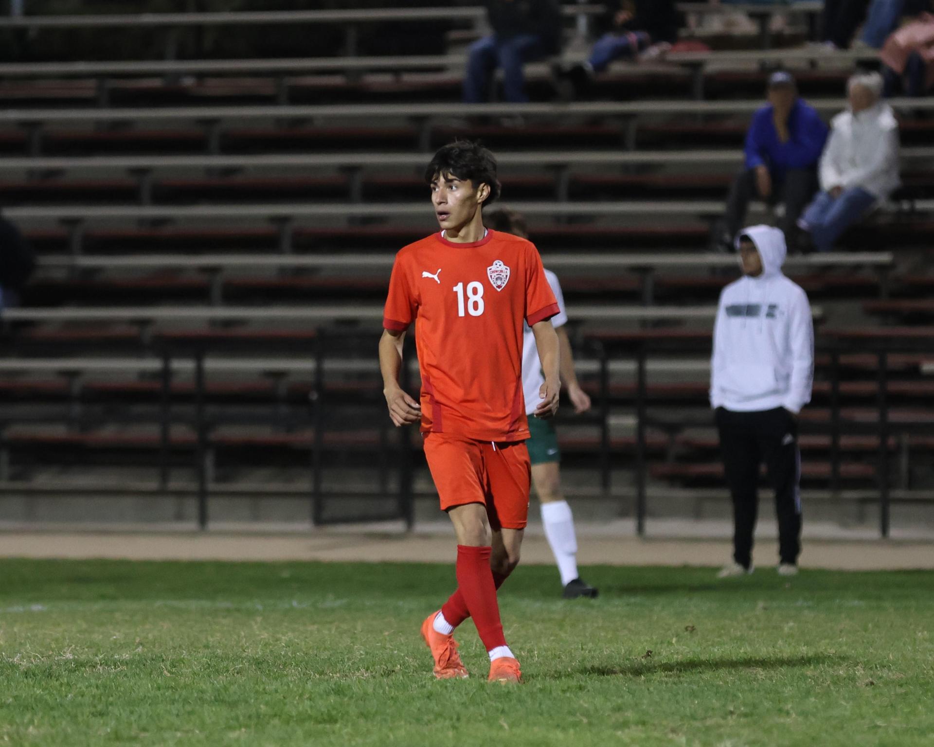 Varsity boys play soccer against Kingsburg