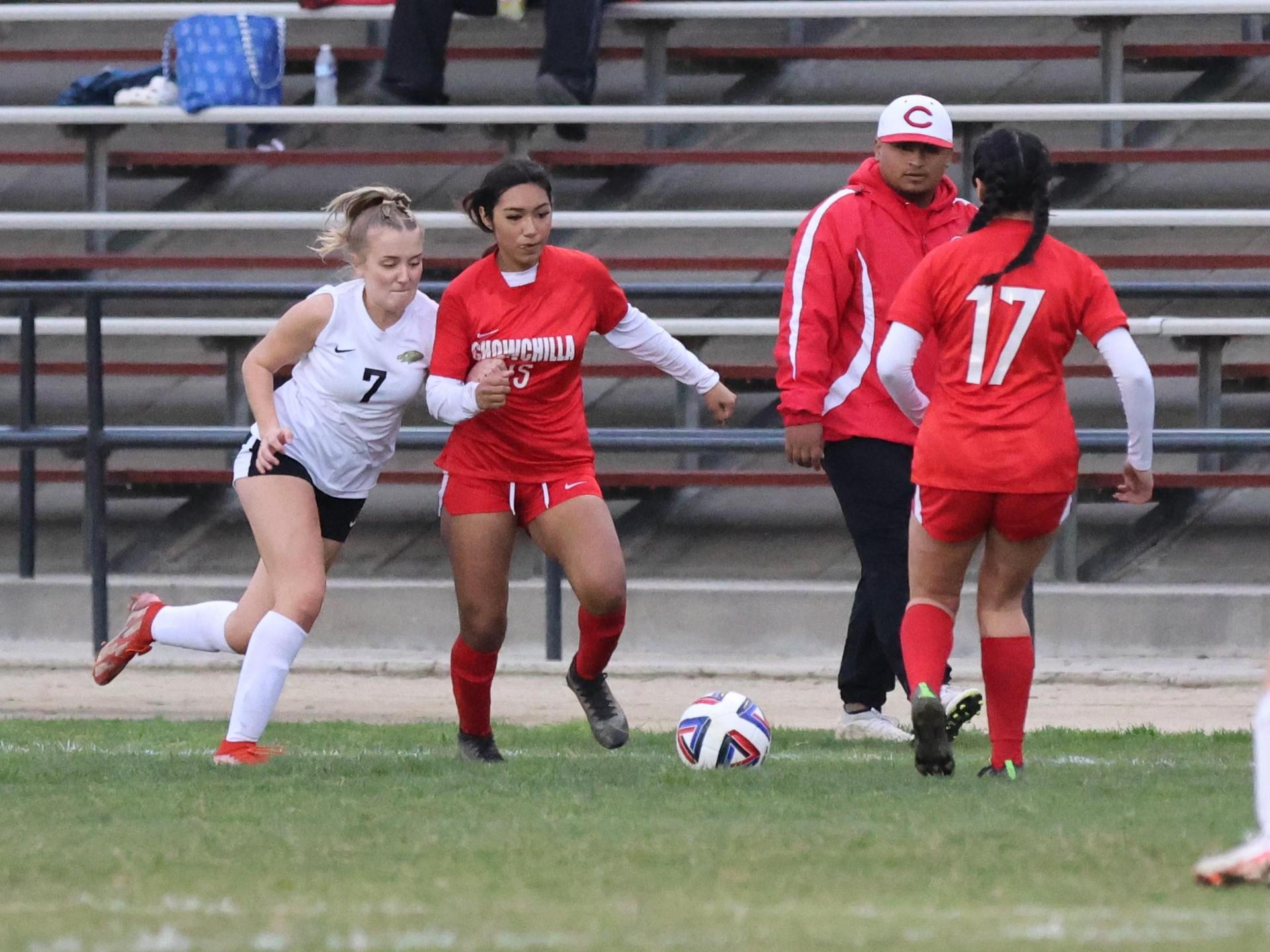 Junior varsity girls playing soccer against liberty