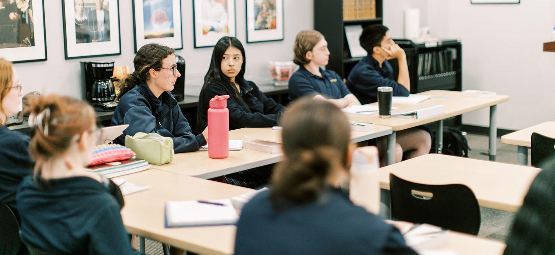 Students take notes at their desks
