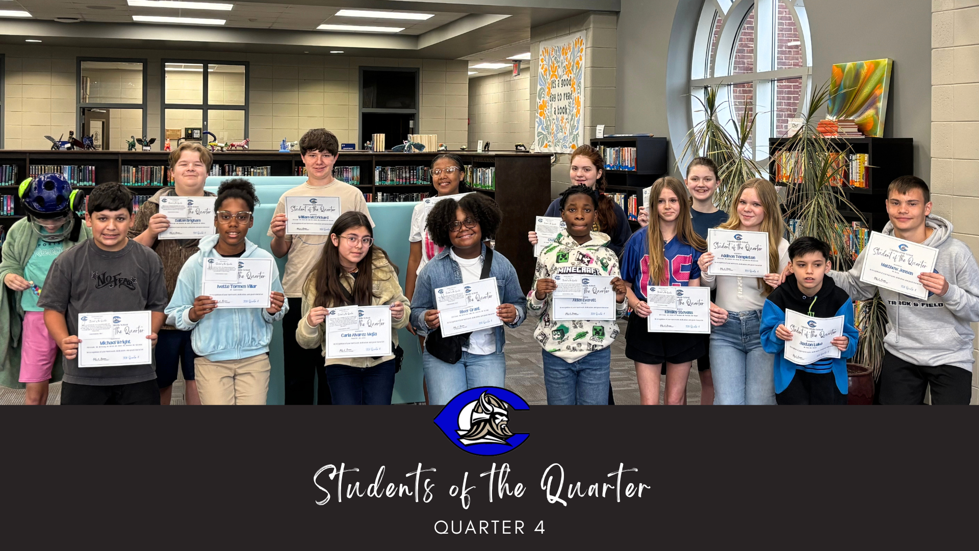 Group of students holding certificates titled 'Students of the Quarter'.