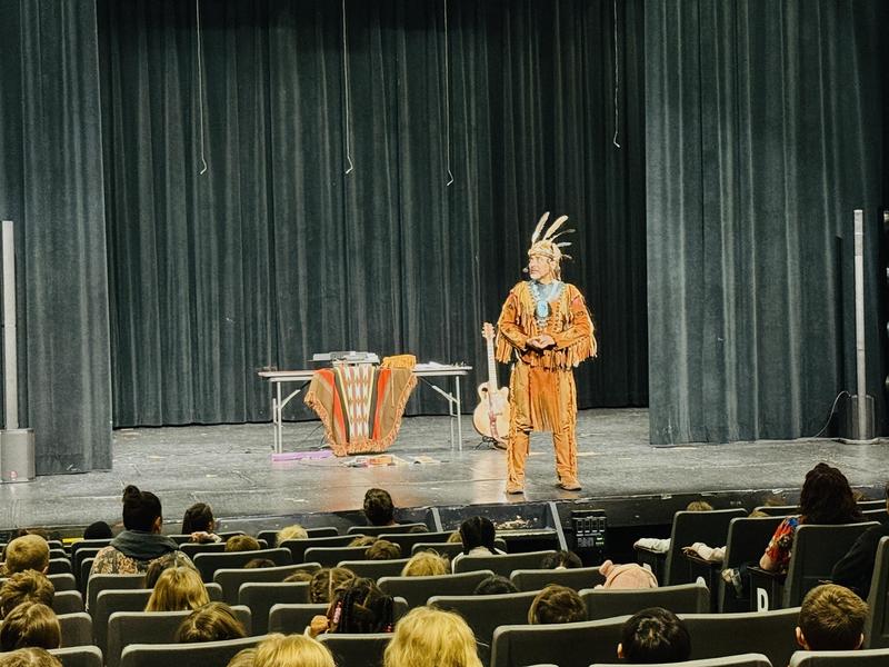Richie Castro tells the story of Kokopelli dressed in Native American wares