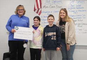 Students present their Circle of Giving donation to the Barry County Substance Abuse Task Force.