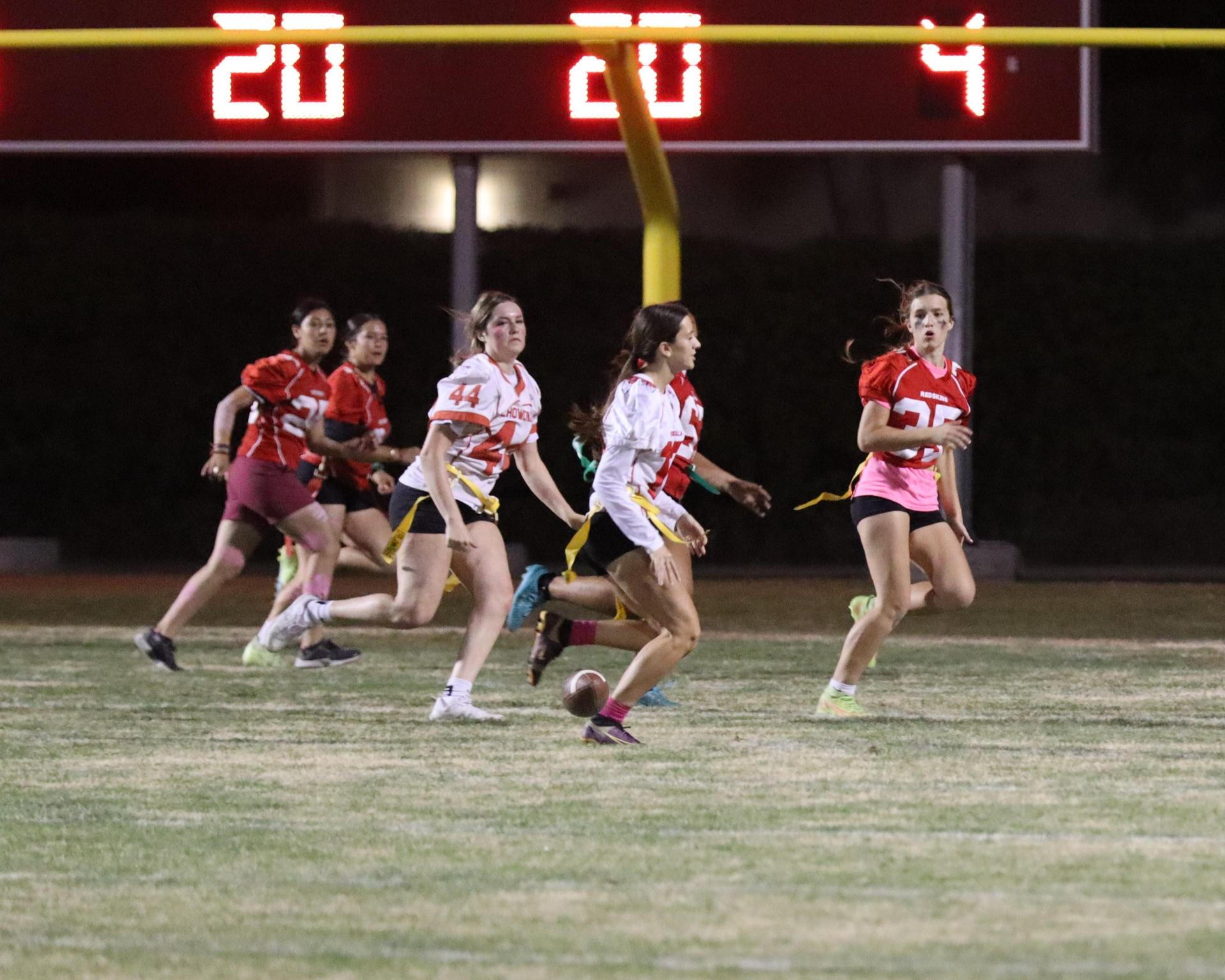 girls playing flag football