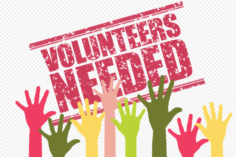 Graphic showing colorful hands with the text "VOLUNTEERS NEEDED" in bold red letters.