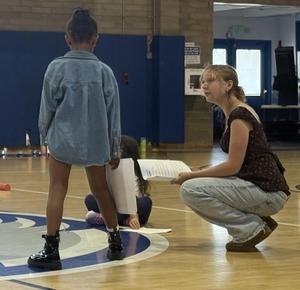 two people in theater workshop