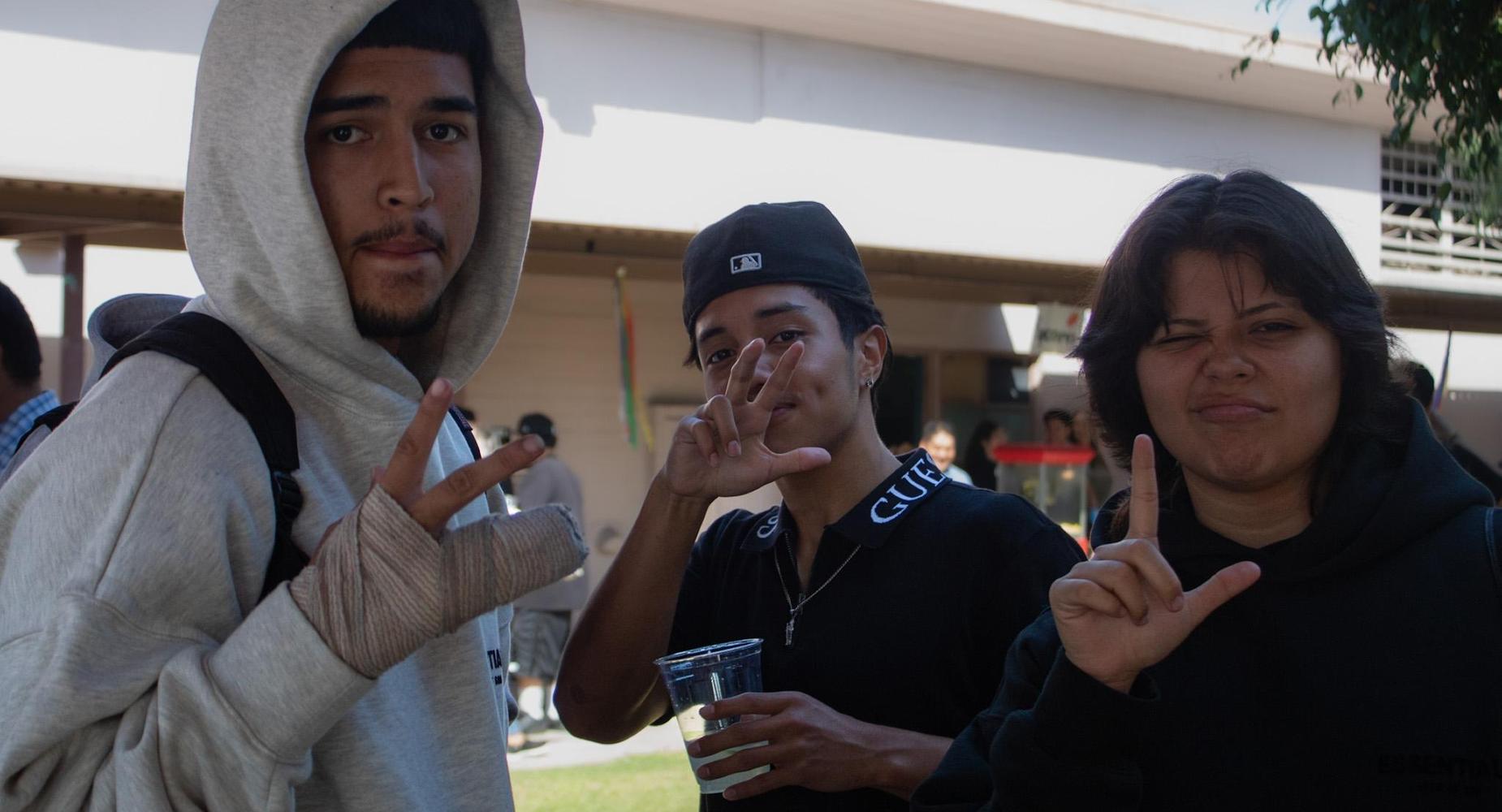 studens saying high at the fall festival.