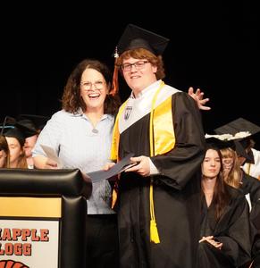Jacob Newland receives a TAEF scholarship from Robin Walters.