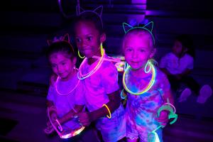 Students at a glow in the dark fun run.