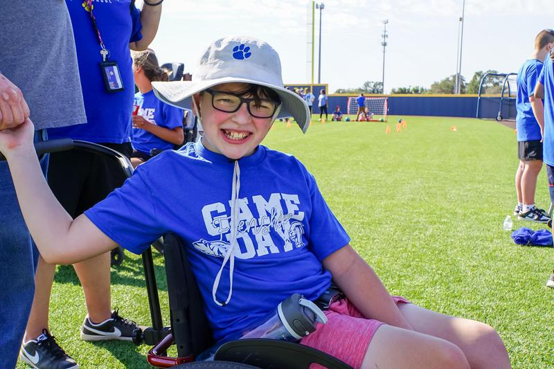special education game day boy in frenship hat in wheel chair
