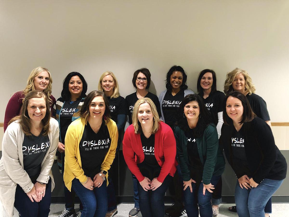 12 ladies in matching shirts