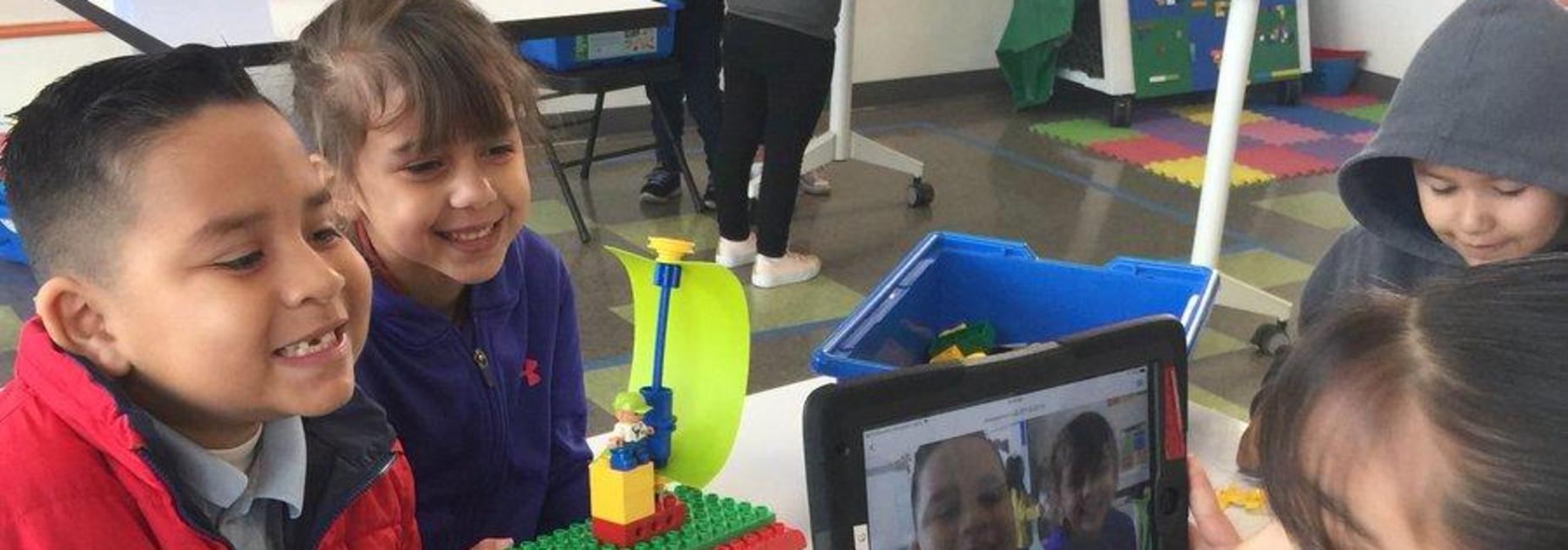 students taking photo with iPad