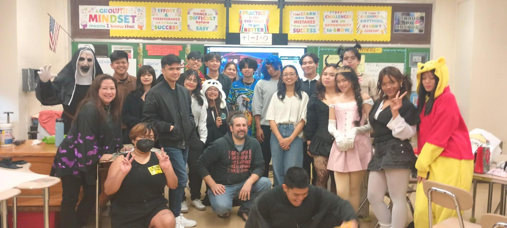 Students wearing costumes in a classroom