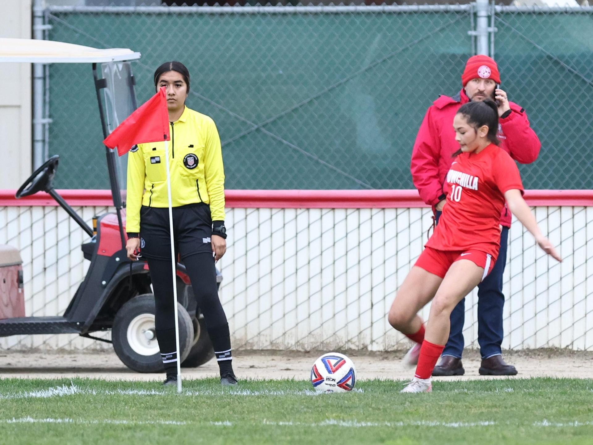 Junior varsity girls playing soccer against liberty