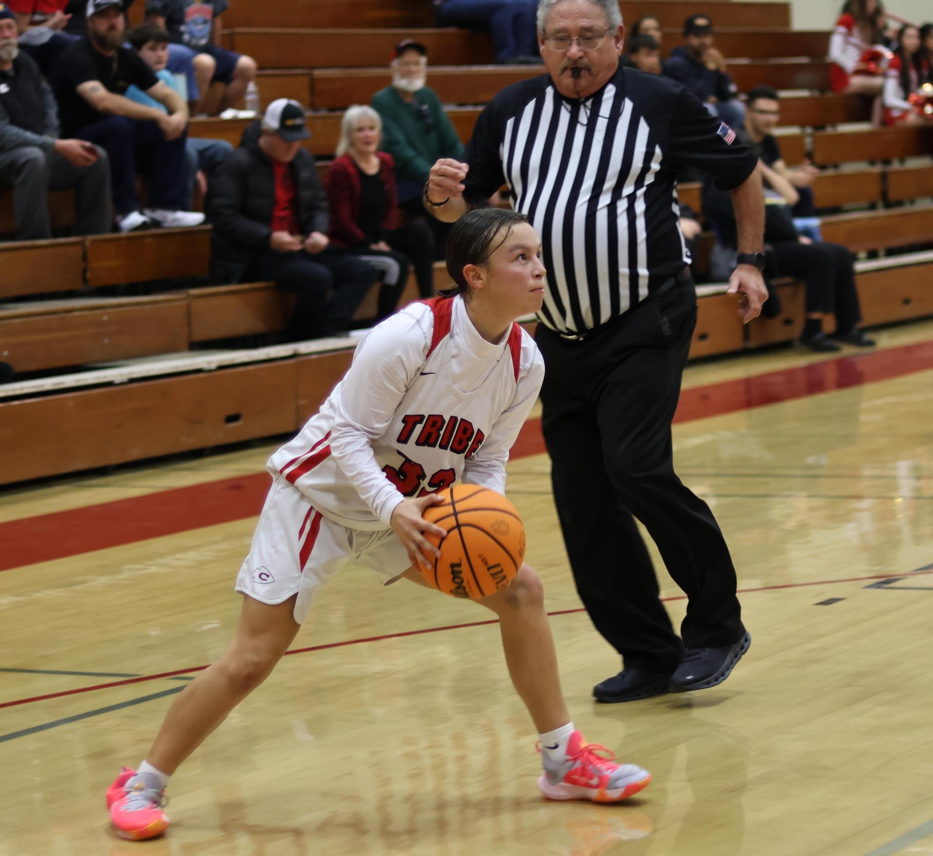 junior varsity girls playing basketball against parlier