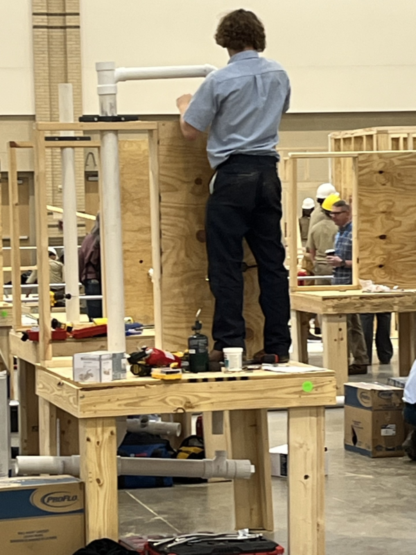 Students working in construction setting