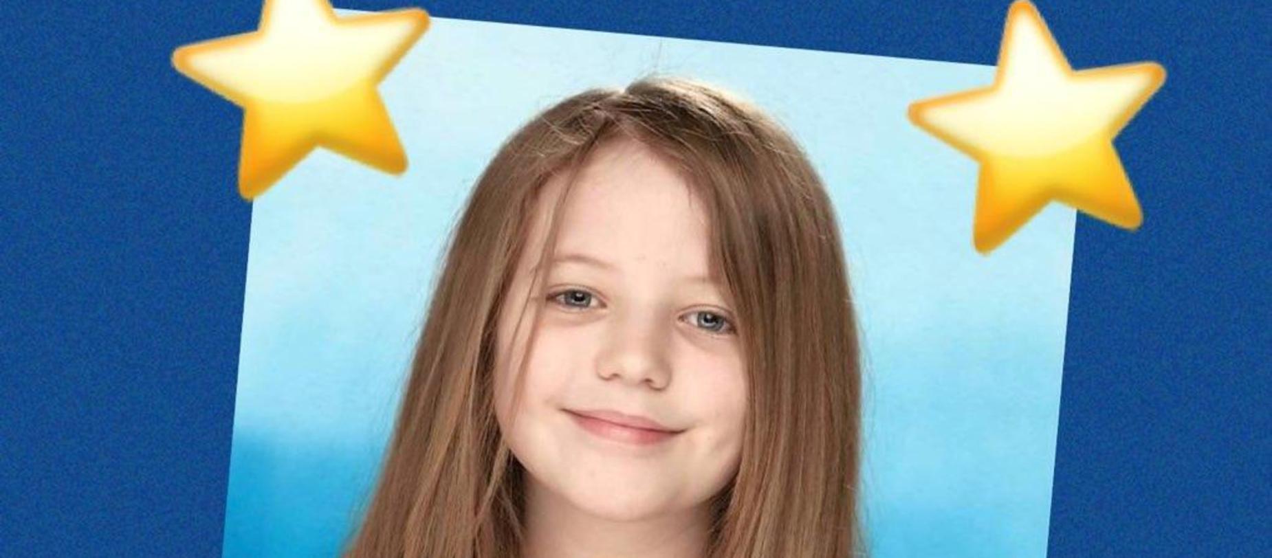 girl smiling for the camera