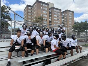 boys football team on the bleachers