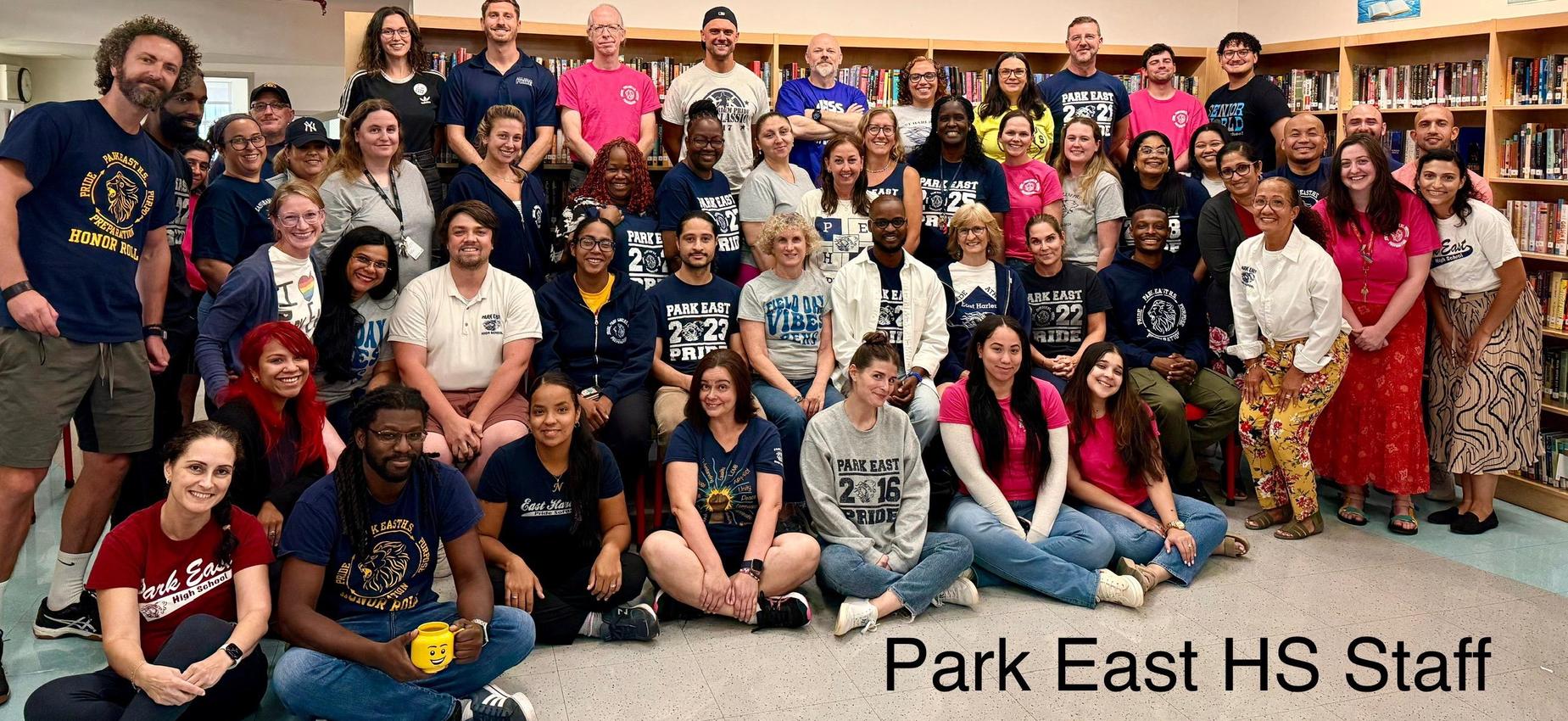 Staff posing in library, September 2025