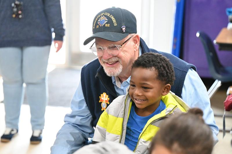 student with volunteer