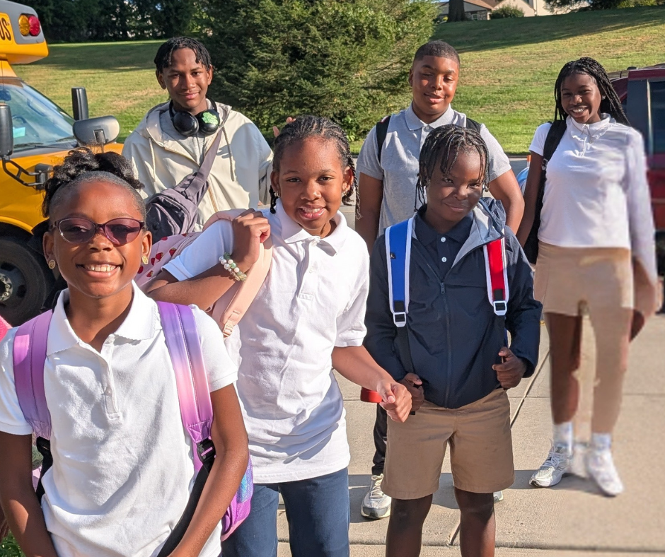 Students working with stem teacher