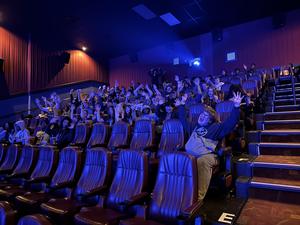 Boys movie theatre group picture