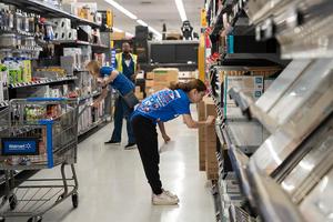 A teacher selects supplies for her classroom