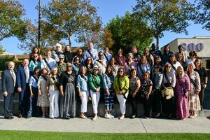 Superintendent Dr. Taylor and the Board of Trustees pose together for a group photo at the event.