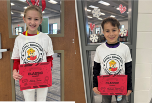 Students holding Classic Reader Award