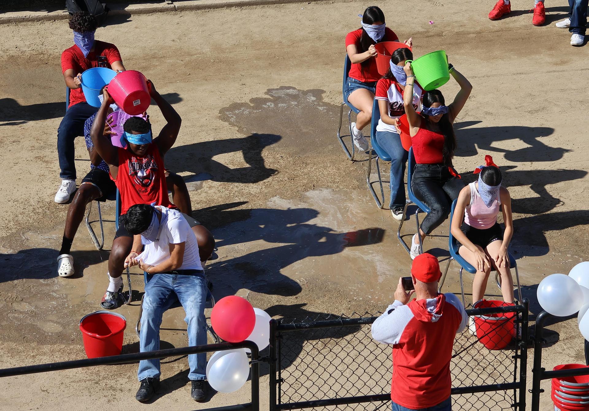 students and staff at the homecoming rally