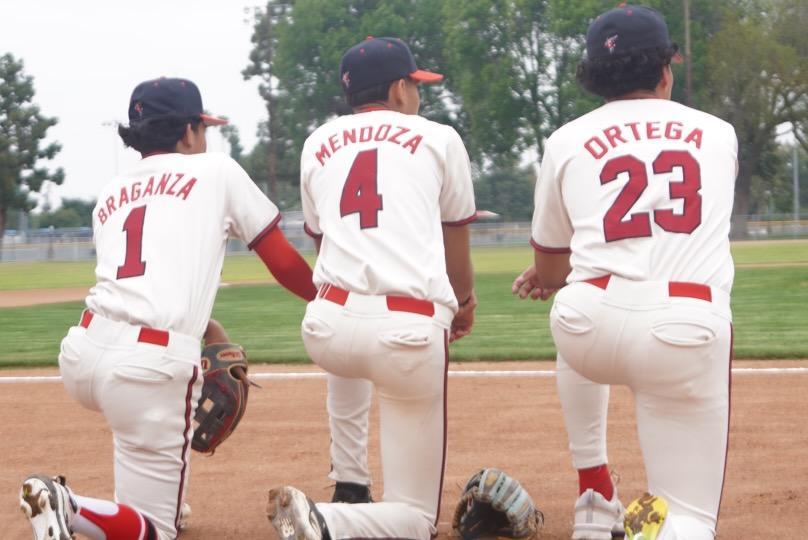 players kneeling