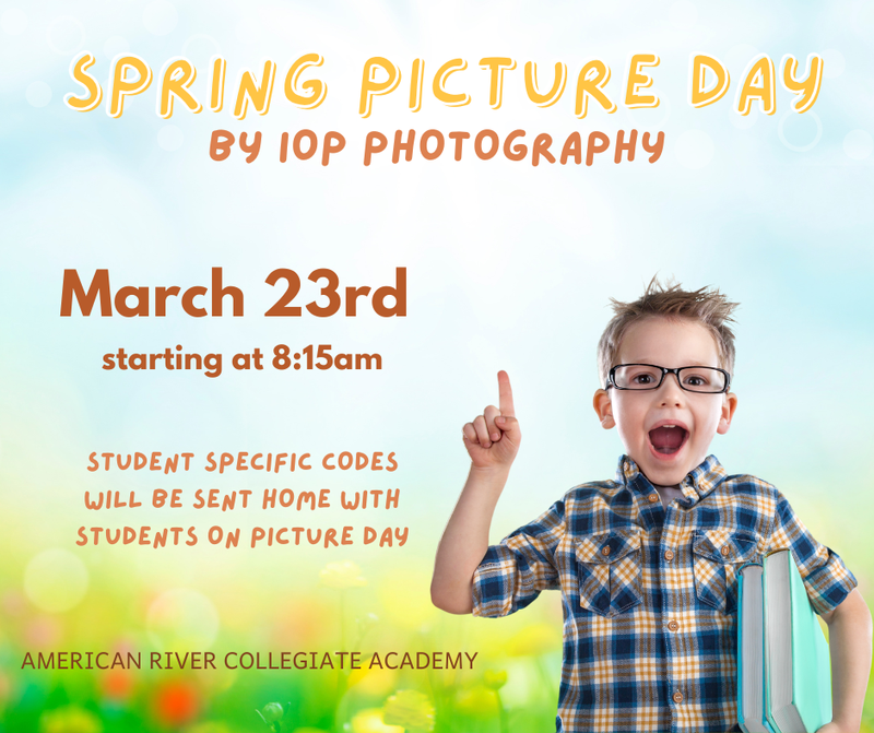 boy with gladsses, plaid shirt and smiling. Spring flowers in the background. Spring Picture day March 23
