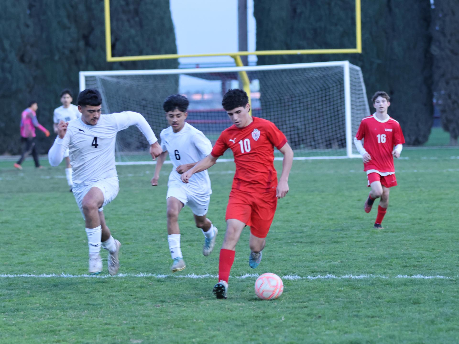 junior varsity boys playing soccer against washington union