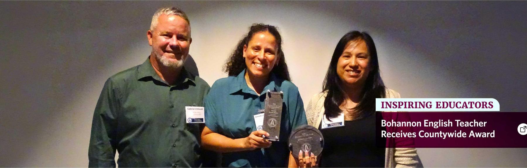 Teacher Anneka Harper-Knox is pictured with administrators after receiving her countywide award.