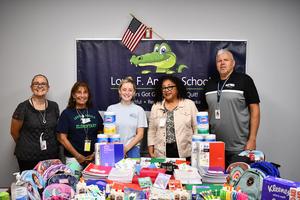 Members of the BPS team with Nicole Lee, a nurse at Boston Children's Hospital