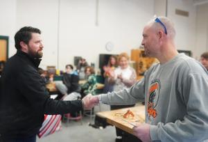 Kenan Smith gives Dayne Fletke an award.