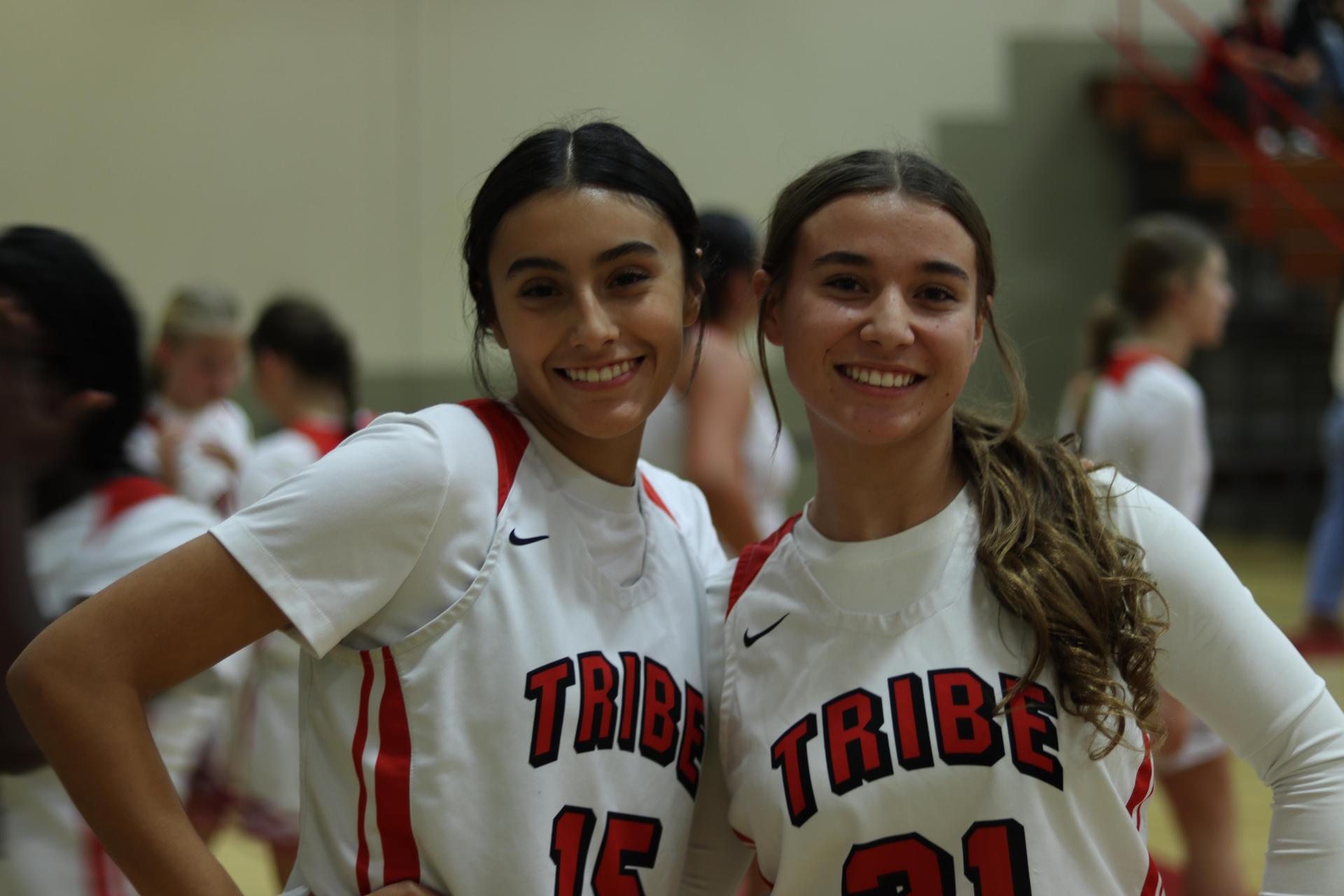 varsity girls playing basketball against mariposa