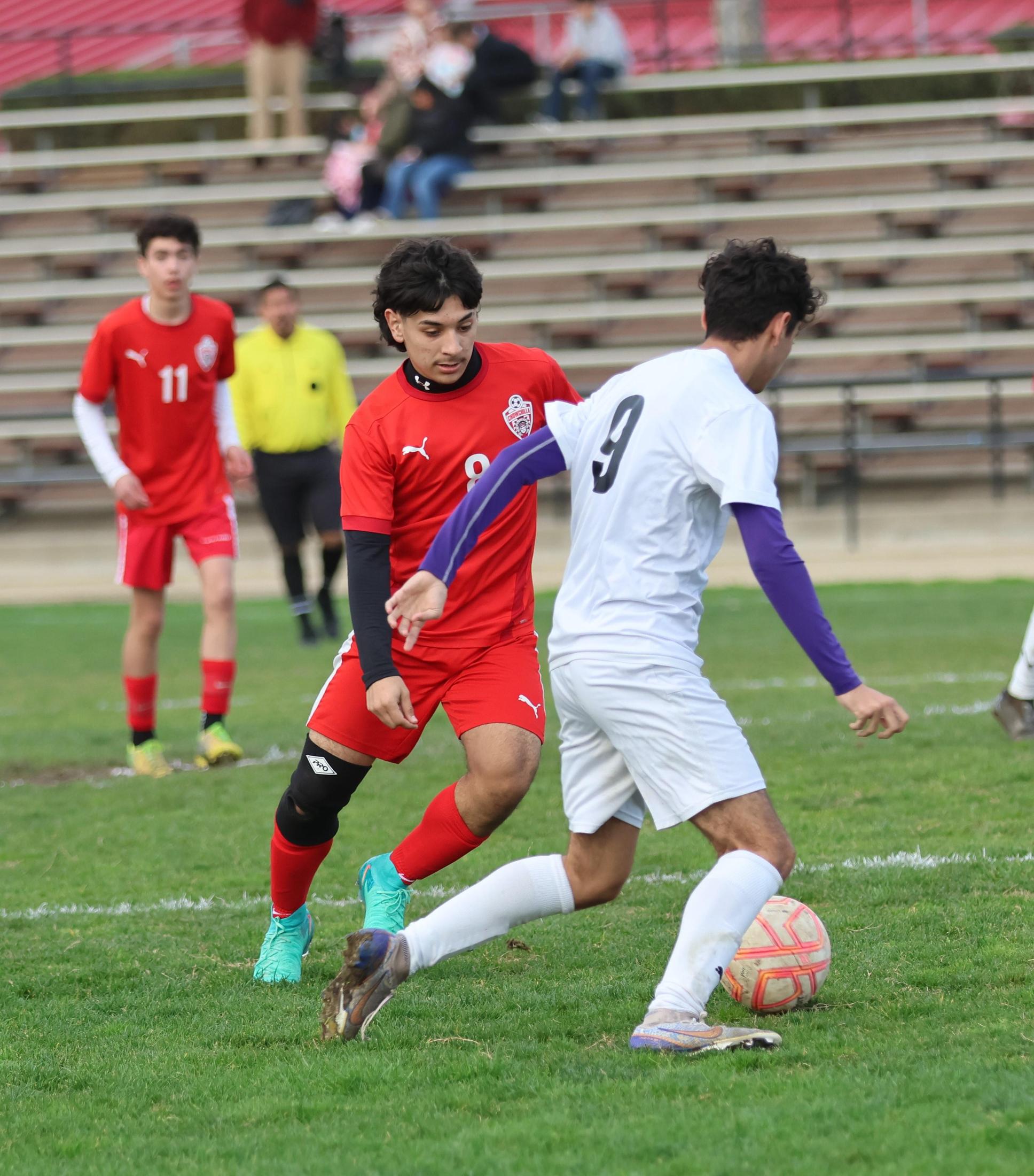 junior varsity boys playing soccer against washington union
