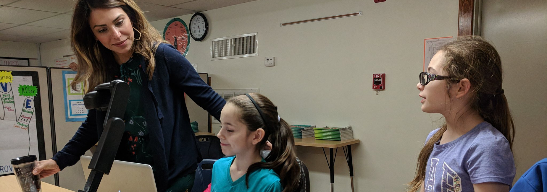 Principal with students.